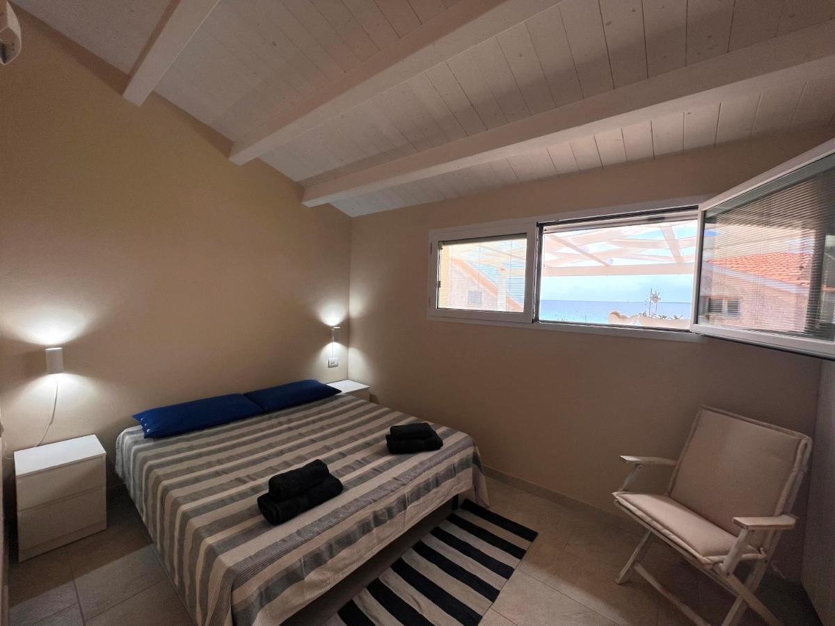 Appartement Fronte Mare S'Arena Scoada à Putzu Idu Extérieur photo