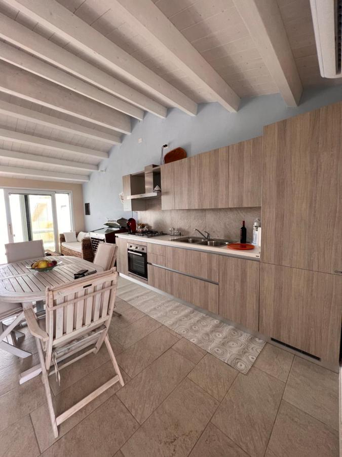 Appartement Fronte Mare S'Arena Scoada à Putzu Idu Extérieur photo